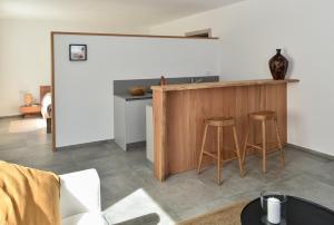 Kuchyň nebo kuchyňský kout v ubytování L'Abbraccio della Quercia - Apartments