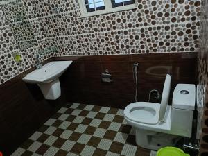Koupelna v ubytování Thekkekara Budget Rooms