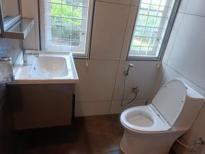 Koupelna v ubytování Thekkekara Budget Rooms