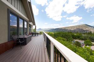 a balcony of a house with a view of the mountains at 29 Timberline Drive in Durango