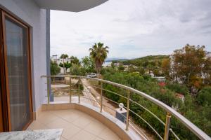 a balcony with a view of a city at Vila Anna in Ksamil