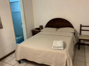 Postel nebo postele na pokoji v ubytování Hostal Almagro + 16 fotografií