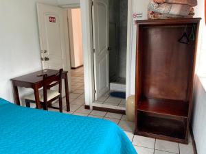 Postel nebo postele na pokoji v ubytování Hostal Almagro