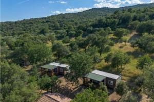 an aerial view of a house on a hill at Redabba House in Arzana