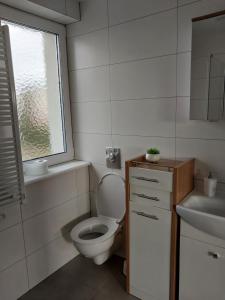 Vannituba majutusasutuses Wynajme domek, pokój