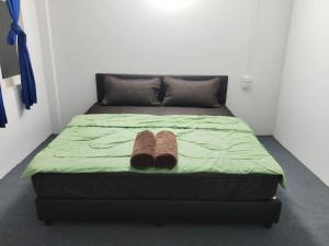 Postel nebo postele na pokoji v ubytování Banphe​ Hostel