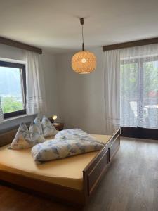 Postel nebo postele na pokoji v ubytování Haus Käfersberg