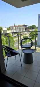 Balkon lub taras w obiekcie Apartament z widokiem na Wawel w centrum miasta