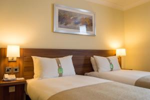 Postel nebo postele na pokoji v ubytování Holiday Inn Leeds Garforth by IHG