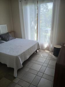 Postel nebo postele na pokoji v ubytování Appartement lumio