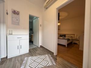 Postel nebo postele na pokoji v ubytování Apartmani Meri