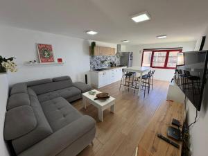 a living room with a couch and a table at The Whiter House in Gáldar