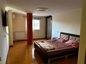Katil atau katil-katil dalam bilik di Appartement trouville