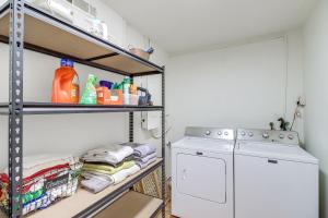 a laundry room with a washer and dryer at 2 Mi to Buffalo River Peaceful Family Retreat  +25 photos