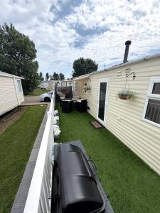 aificialificialificialificialificialificialificialificialificialificialificialificialificialificialificial at Bright Family Caravan with Deck & BBQ at Seawick Holiday Park, Clacton in Clacton-on-Sea +12 photos