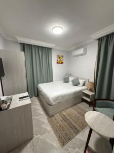 Letto o letti in una camera di Topview Pyramids And Museum
