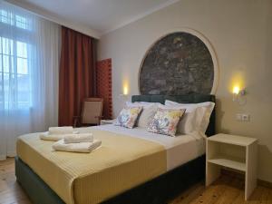 Giường trong phòng chung tại Central Bliss Apartments No1