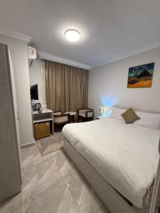 Letto o letti in una camera di Topview Pyramids And Museum