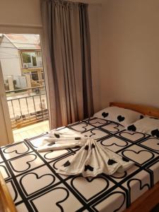 En eller flere senge i et værelse på Casa Betty