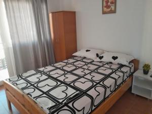 En eller flere senge i et værelse på Casa Betty