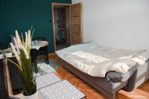 Giường trong phòng chung tại Zielona Przystań +10 ảnh