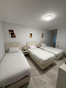 Letto o letti in una camera di Topview Pyramids And Museum