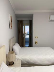 Letto o letti in una camera di Topview Pyramids And Museum