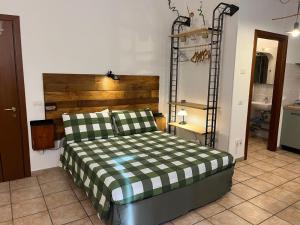 Postel nebo postele na pokoji v ubytování Casa e Giardino Relax in Crema