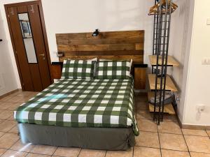 Postel nebo postele na pokoji v ubytování Casa e Giardino Relax in Crema