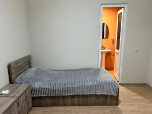 Postel nebo postele na pokoji v ubytování GM Hotel