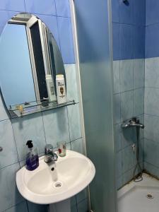 Koupelna v ubytování GM Hotel
