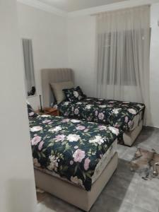 Postel nebo postele na pokoji v ubytování Appartement moderne - Marrakech