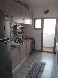 Kuchyň nebo kuchyňský kout v ubytování Appartement moderne - Marrakech