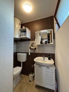 Kúpeľňa v ubytovaní Apartman M - sa dvije spavaće sobe