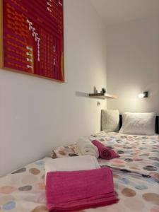 Posteľ alebo postele v izbe v ubytovaní Apartman M - sa dvije spavaće sobe