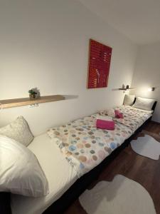Posteľ alebo postele v izbe v ubytovaní Apartman M - sa dvije spavaće sobe