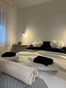 Posteľ alebo postele v izbe v ubytovaní Apartman M - sa dvije spavaće sobe
