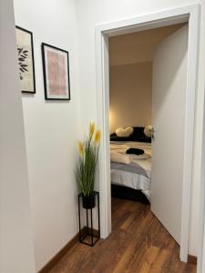 Posteľ alebo postele v izbe v ubytovaní Apartman M - sa dvije spavaće sobe