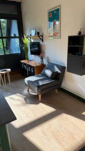 TV a/nebo společenská místnost v ubytování Studio Saint-Lary Soulan village + 12 fotografií