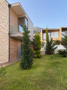 Photo de la galerie de l'établissement London Villa Olea Residence Drimades, à Himarë