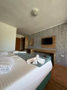 Postel nebo postele na pokoji v ubytování Hotel Surf Primorsko + 23 fotografií