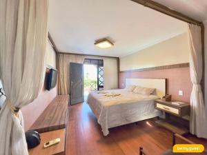 En eller flere senge i et værelse på Vila Frazzano - Porto das Dunas + 37 billeder