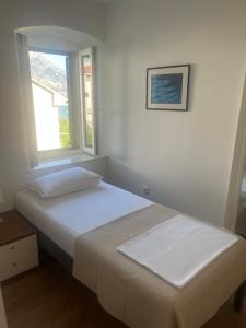 Postel nebo postele na pokoji v ubytování Villa Adria