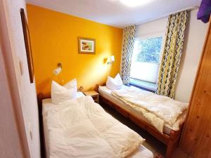 Postel nebo postele na pokoji v ubytování Island house Paul on the island of Poel