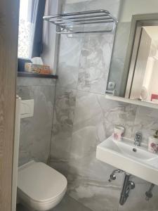 Koupelna v ubytování Ana Rooms Bled