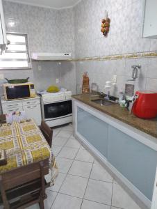 Kuchyň nebo kuchyňský kout v ubytování Apartamento no Centro Histórico