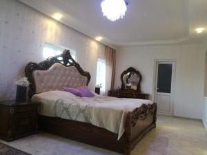 Postel nebo postele na pokoji v ubytování Tamila Guesthouse
