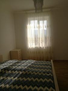 Postel nebo postele na pokoji v ubytování Tamila Guesthouse