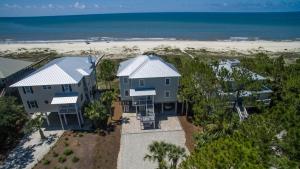 an aerial view of a house and the beach at Heaven's Walk in Indian Pass