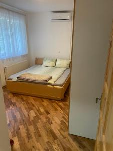 Postel nebo postele na pokoji v ubytování Vila Belko